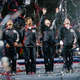 A celebration at the naming of the team at trials in August 2000. Photo credit: Doug Pensinger/Getty